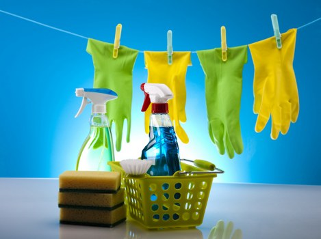Spot cleaning a mattress stain with a cloth